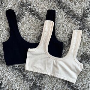 Two ARQ wide strap bra small Natural and Navy